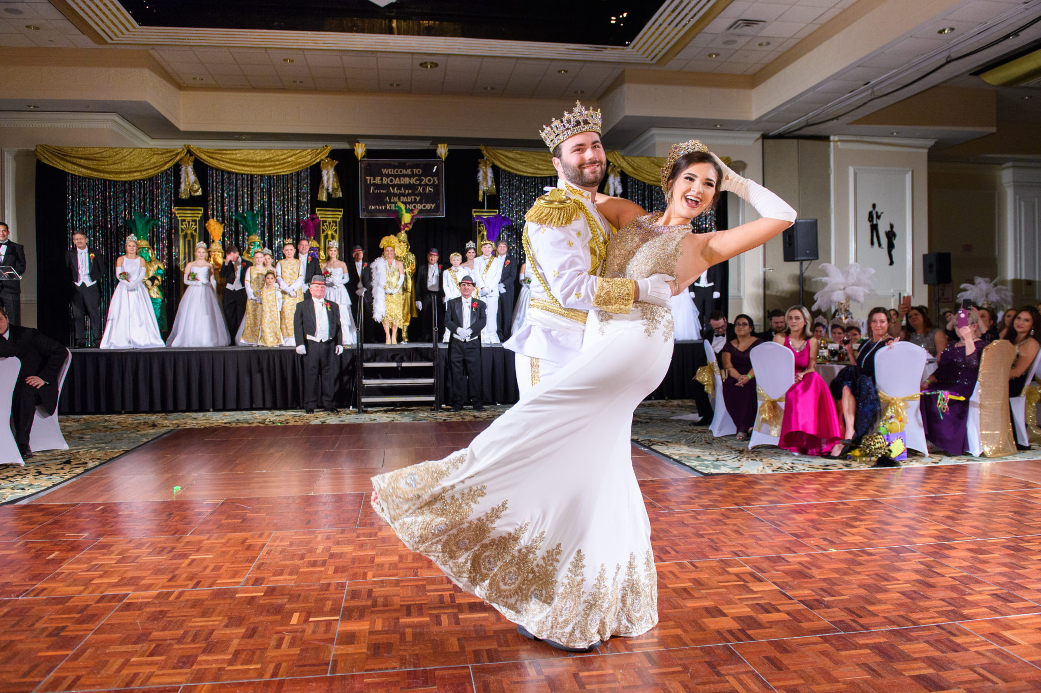 A candid moment from the Mystique Ball
